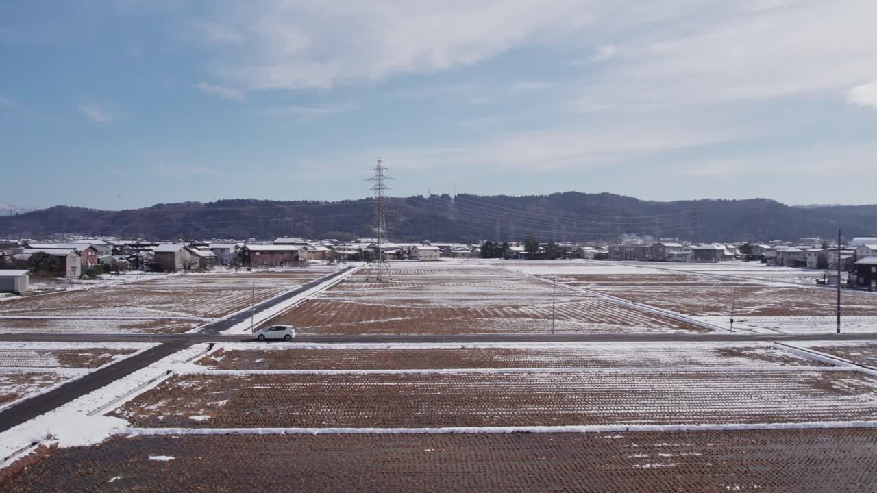 Winter farmland and countryside landscape seen from drone