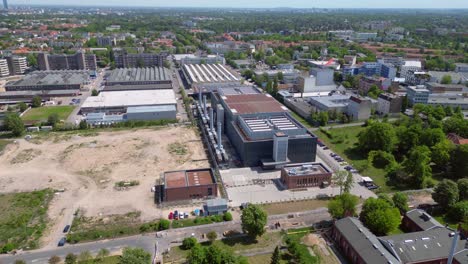 big data cloud storage, industrial air con system cooling ai farm in a large data center in berlin europe. great aerial view flight drone shot footage from above