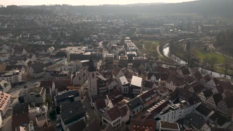 aerial view of a european town with river and historic buildings