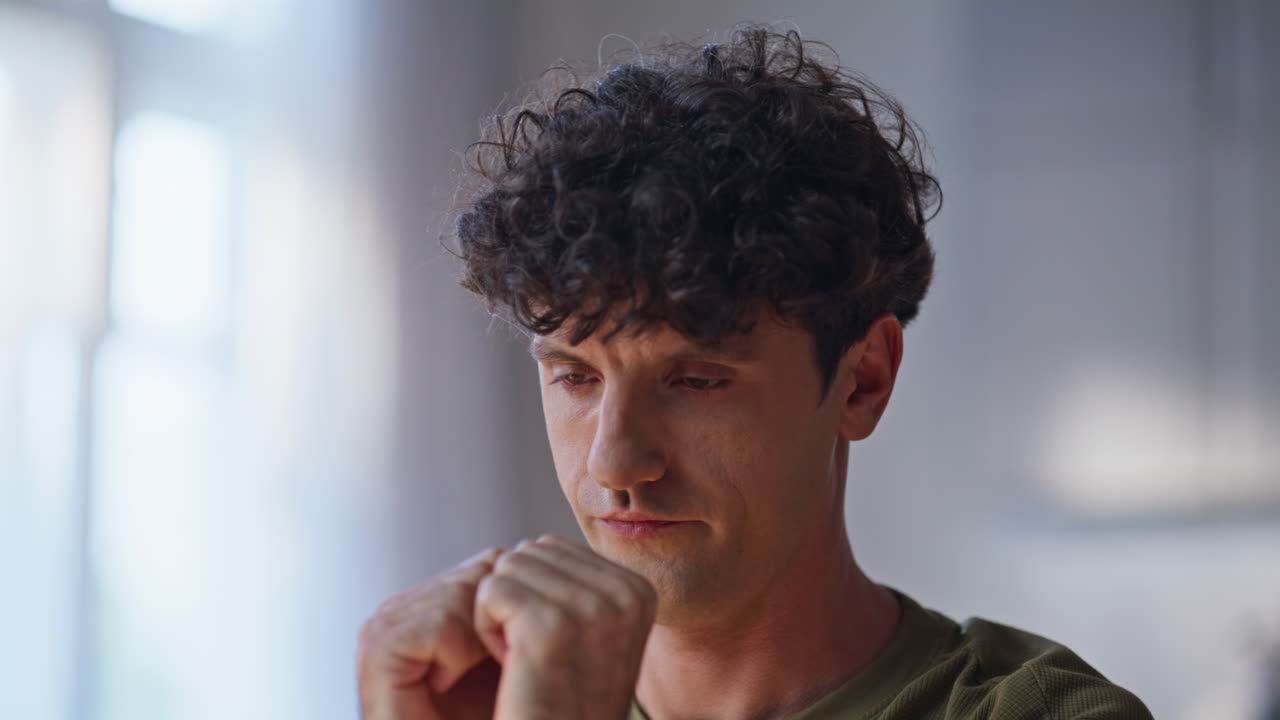 Freelancer suffering neck pain at home closeup. Tired man massaging muscles