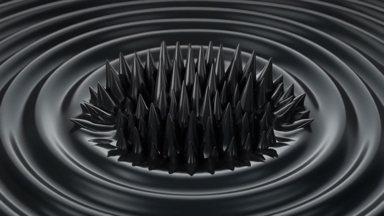 Ferrofluid Spikes Reacting to Magnetic Field in Concentric Ripples