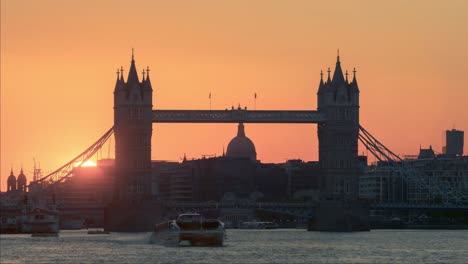 time-lapse of tower bridge at sunset, london, uk