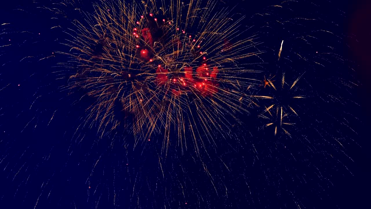 Red and yellow sparkles of fireworks.