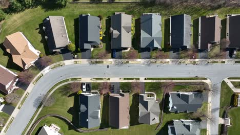 Top-down-aerial-truck-shot-of-neighborhood-in-America-during-early-spring