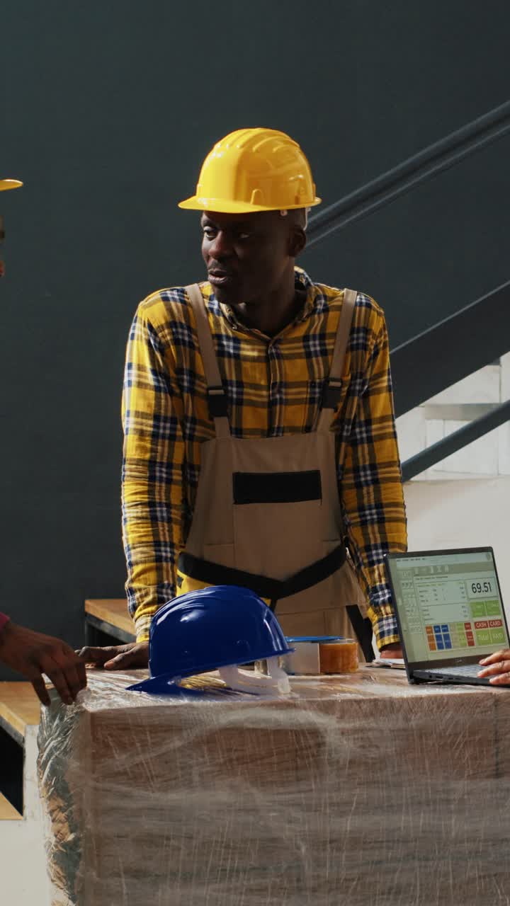 Vertical video: Cheerful workers laughing and checking packages