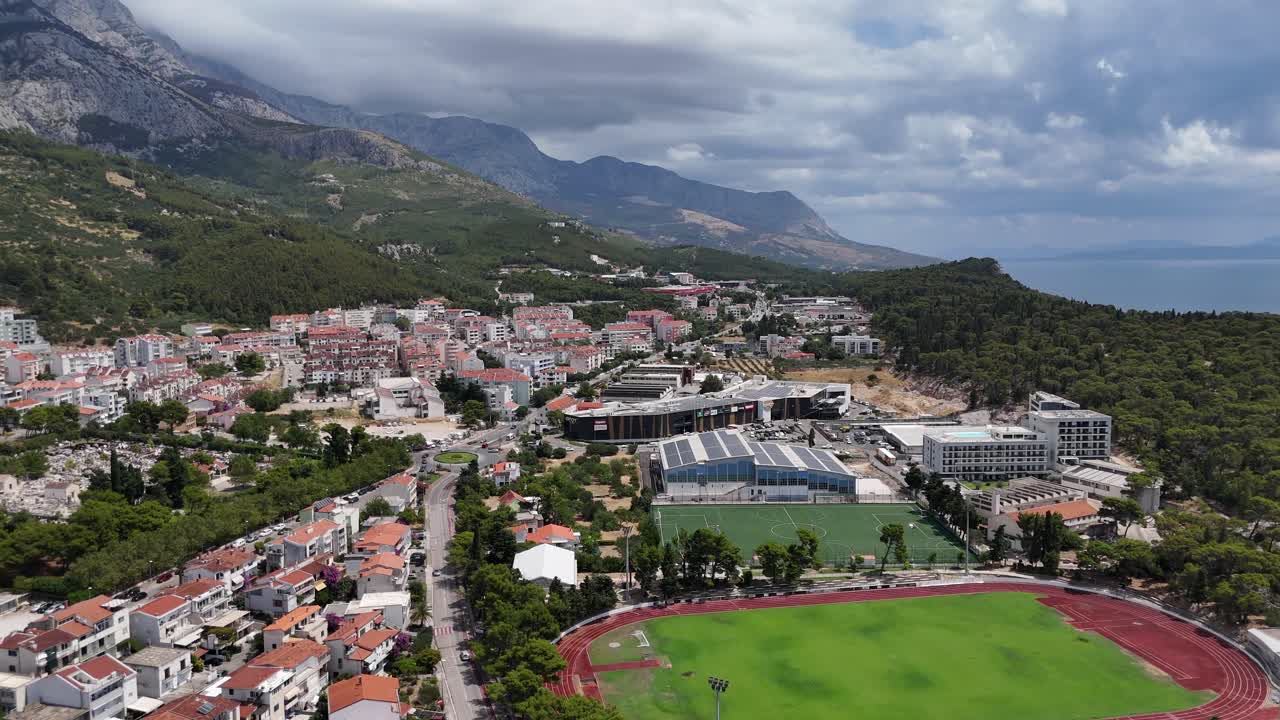 Drone aerial view of makarska harbour town city croatia balkan country balkans Biokovo mountains