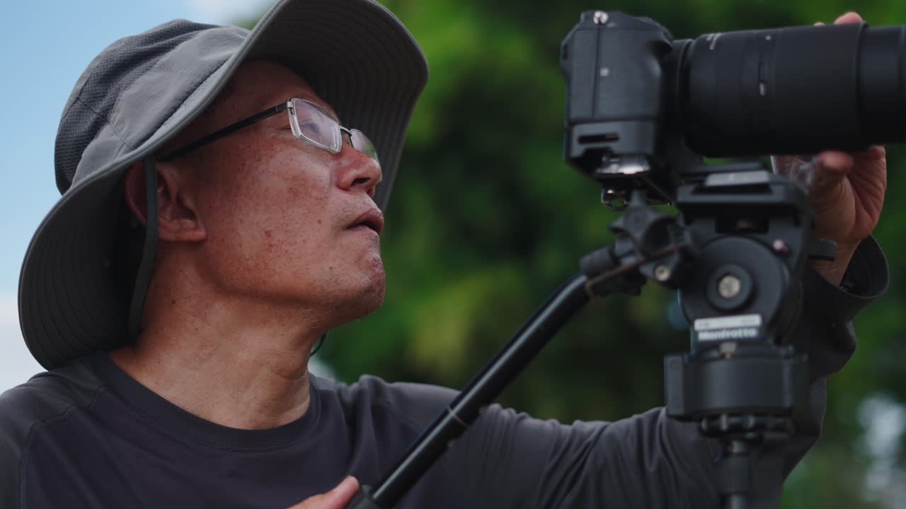 Photographer Taking a Photo Outdoors