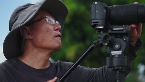 photographer taking a photo outdoors