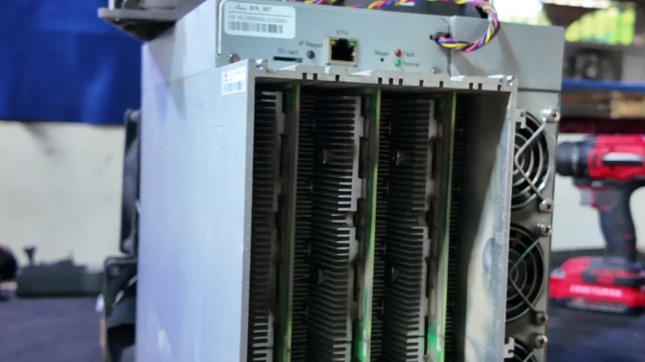 Crypto miner machine zoom out close up card slots and heat sinks