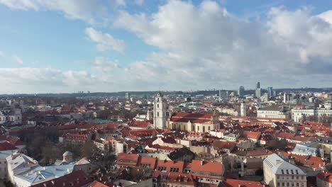 aerial: vilnius city old town on a warm bright day with gediminas tower in background