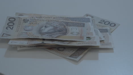 two hunder polish money banknote put on stack of banknote
