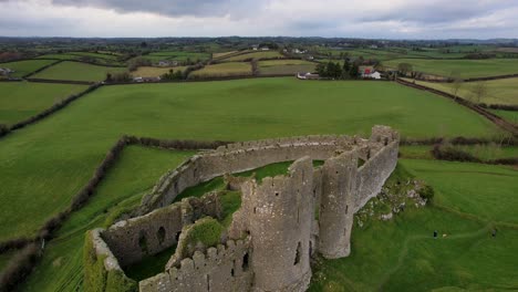 an aerial 4k circular shot of the spectacular norman castle roche remains high on a rocky outcrop in co louth nr dundalk