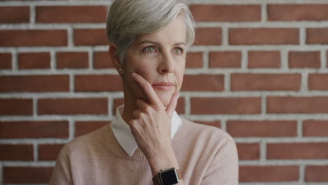 portrait successful middle aged business woman brainstorming ideas looking pensive senior female wearing smart watch