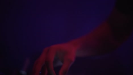 dj playing music at a nightclub