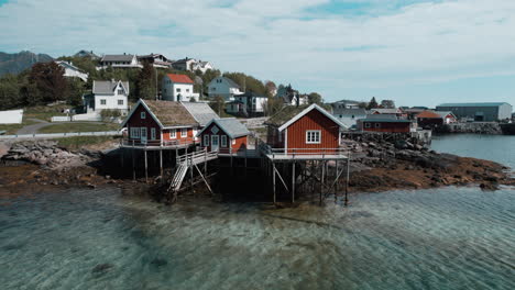 Fantastic-shot-of-the-typical-red-houses-of-the-village-of-Hamnoy-in-the-municipality-of-Moskenes-on-a-spring-day