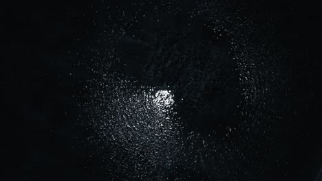 circle water ripple effect under the moonlight