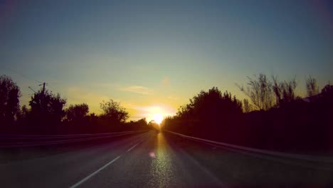 car moves along an asphalt road