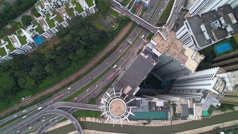 cars traffic on highway 1 jalan kuching next to regalia residence in kuala lumpur malaysia - aerial top down