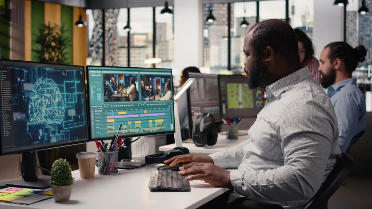 Black filmmaker using AI-driven editing software for cutting montage clips