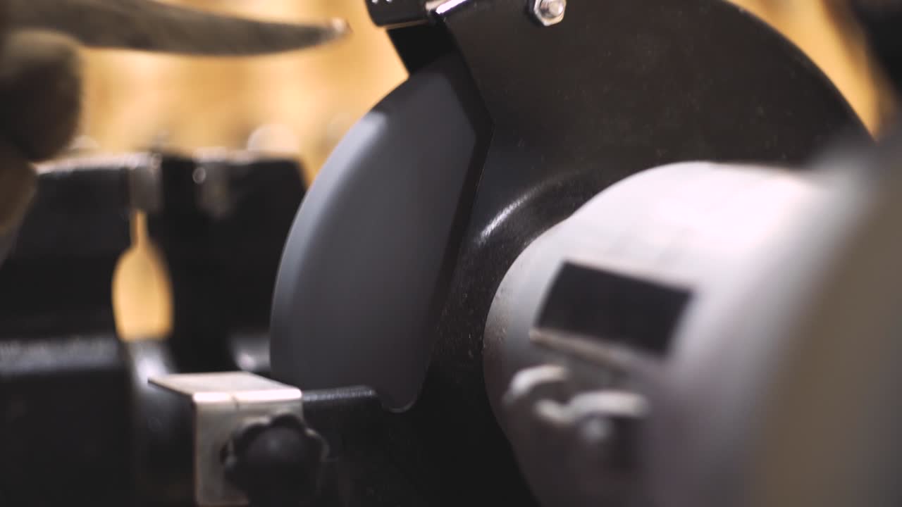 Sharpening a knife on a machine