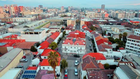 tilt down bird's eye view of the entrance of the conjunto virginia opazo in the republica neighborhood in santiago, chile.