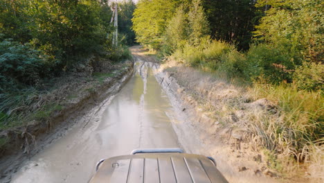 Suv-Rides-On-An-Extremely-Bad-Dirt-Road-A-Top-View-Stabilized-On-3-Axes-Shot