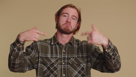 happy bearded man feeling very proud pointing hisself, looking self-confident, overjoyed by success