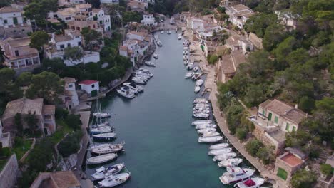 wide shot of cala figuera in the east of mallorca during day time, aerial