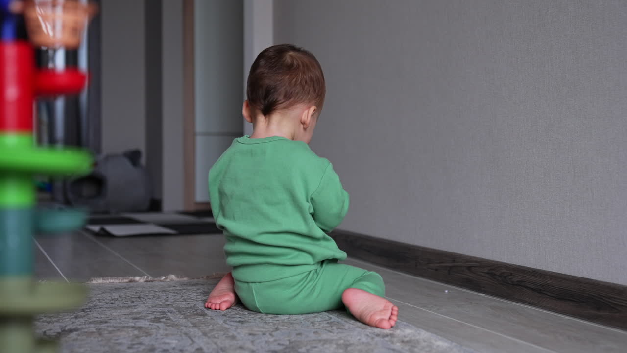 Baby playing on the floor
