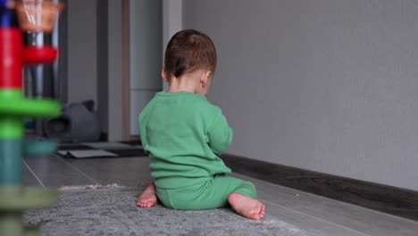 baby playing on the floor