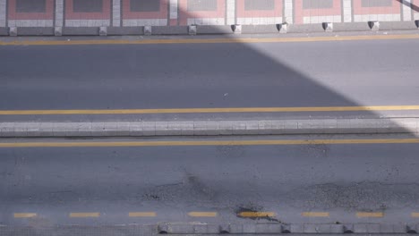 high angle view of city street with car