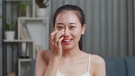 woman with gold eye patches