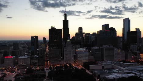 drone shot of sears tower at twilight hour