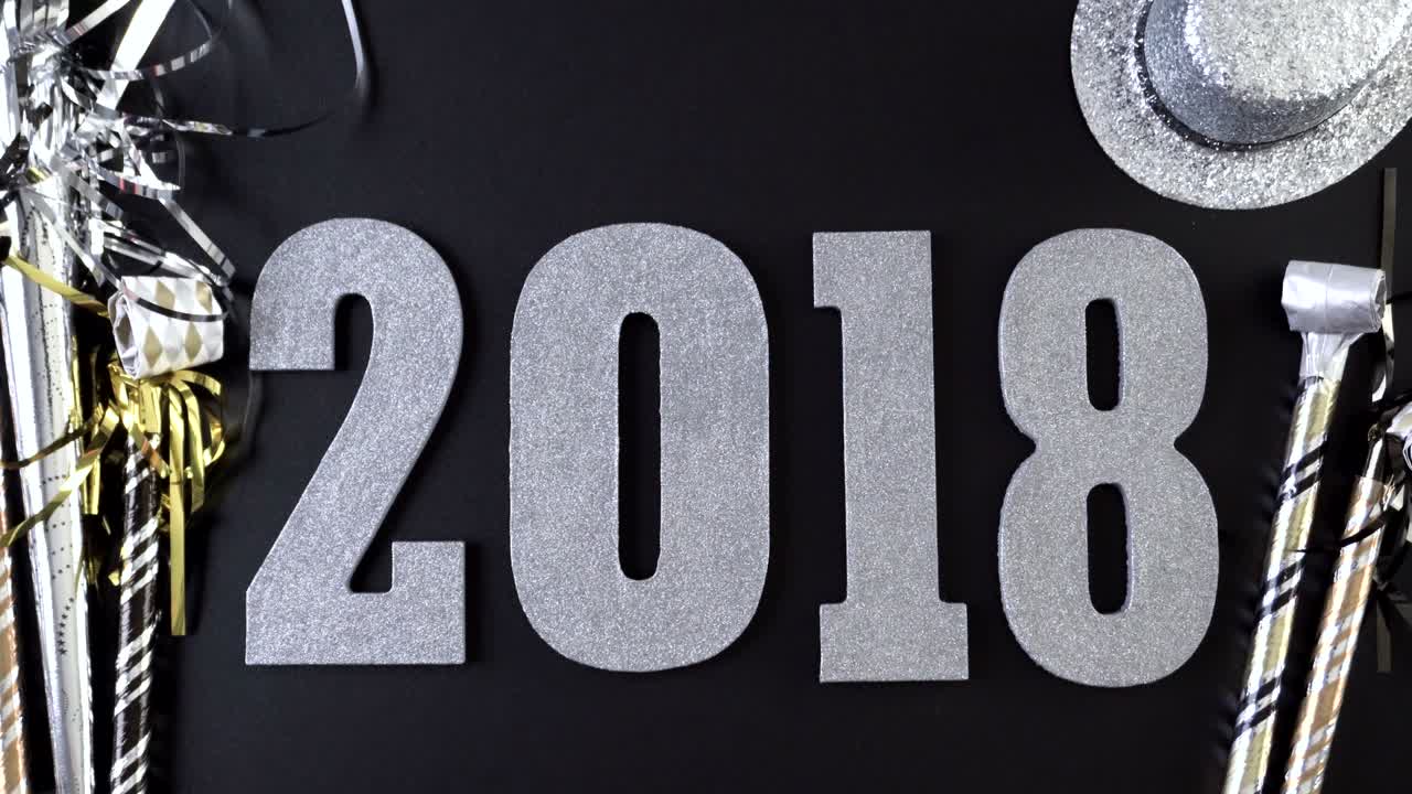 Silver numbers of 2018 Year on a black background.