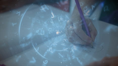 Alphabets floating and spinning against close up of a student hand drawing in a book at school