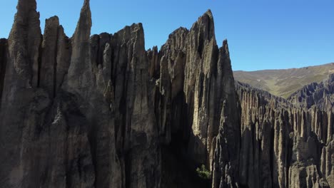 aerial: unique surreal eroded rock spires in high altiplano of bolivia