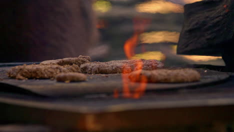 Close-up-shot-of-delicious-meat-grilling-on-barbecue-in-a-outdoor-grill-in-Norway