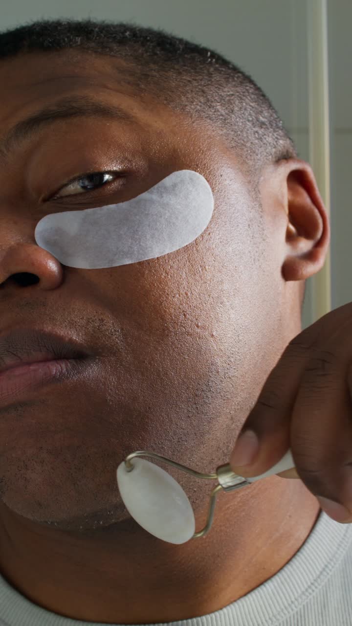 Man applying skin care products
