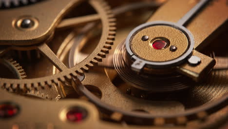 rueda de equilibrio y engranajes en un reloj de oro abierto, reloj en macro