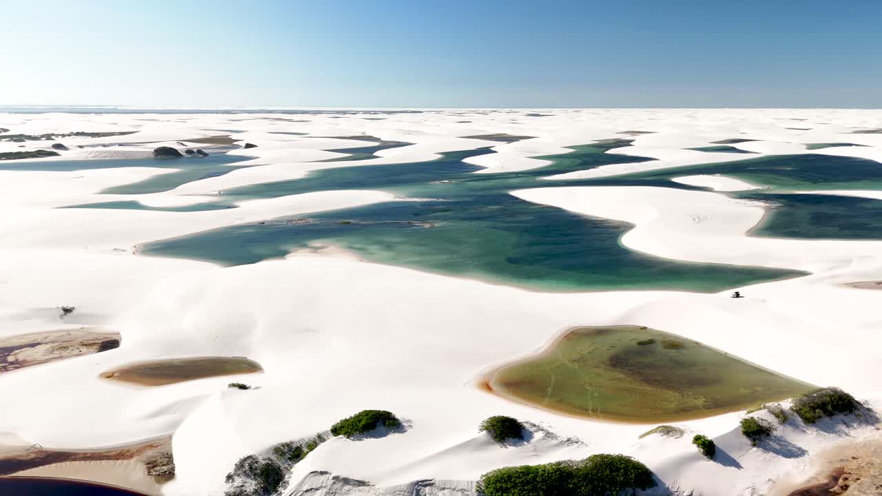 Drone view of dunes and lagoons in Lençóis Maranhenses National Park - Rota Lagoa Azul, Maranhão, Brazil