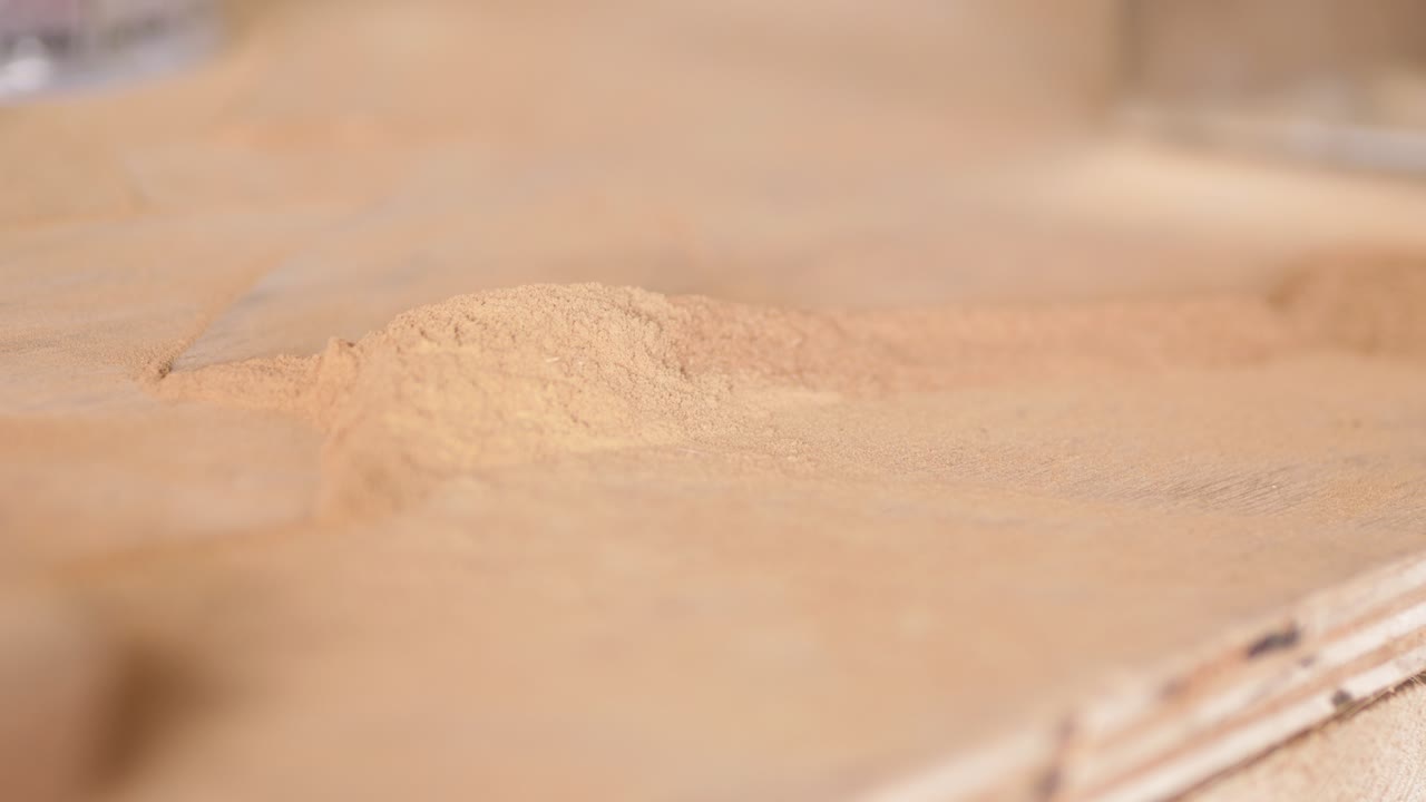 Cleaning worktop of sawdust debris