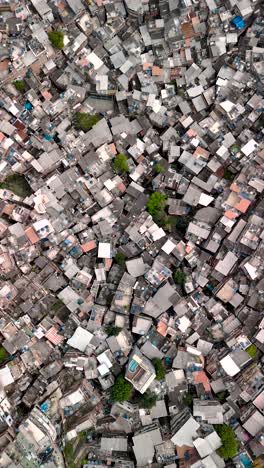 drone top-dow view of favela rocinha rio de janeiro brazil, endless houses stacked atop each other