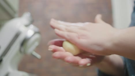 rolling sugar cookie dough into balls