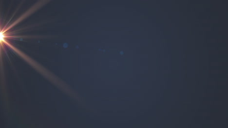 mancha naranja brillante de luz parpadeando contra un fondo azul
