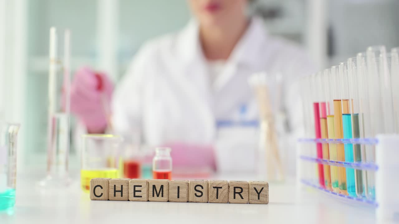 Chemistry Experiment in a Lab with Scientist and Equipment