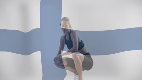 animation of flag of finland over caucasian female athlete