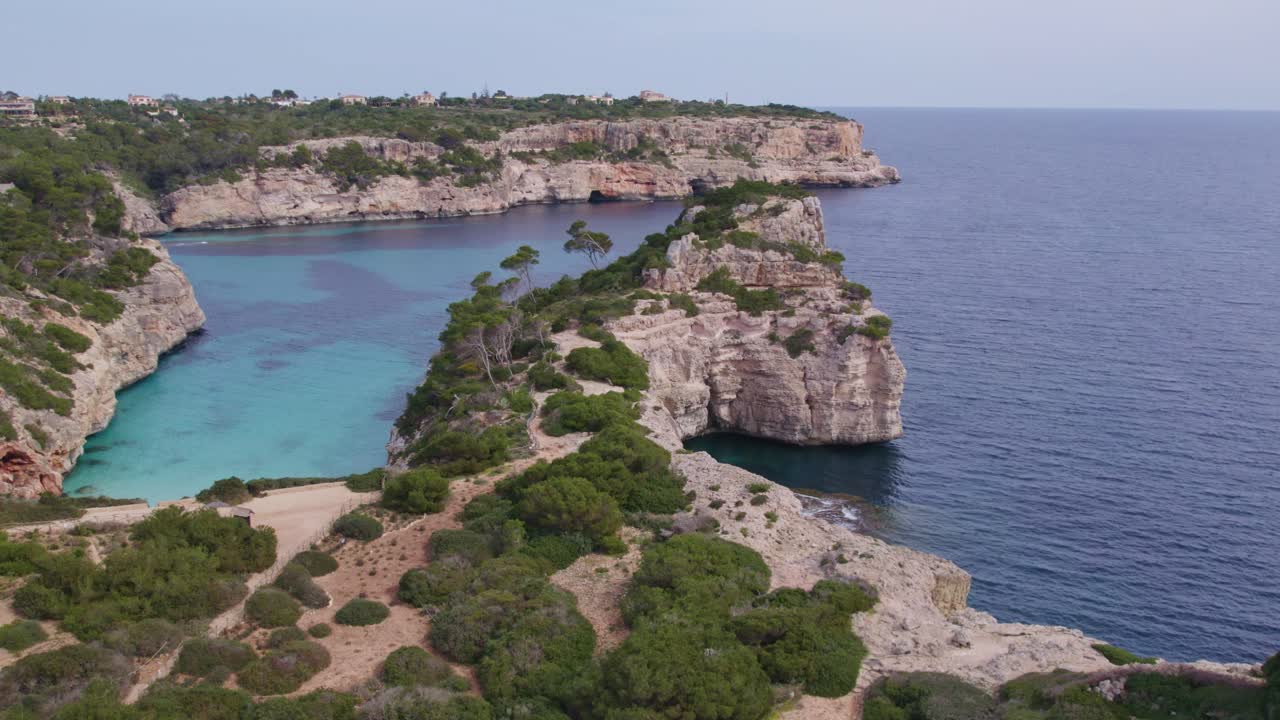 Flying around S'Almonia beach Mallorca during day time with no people, aerial