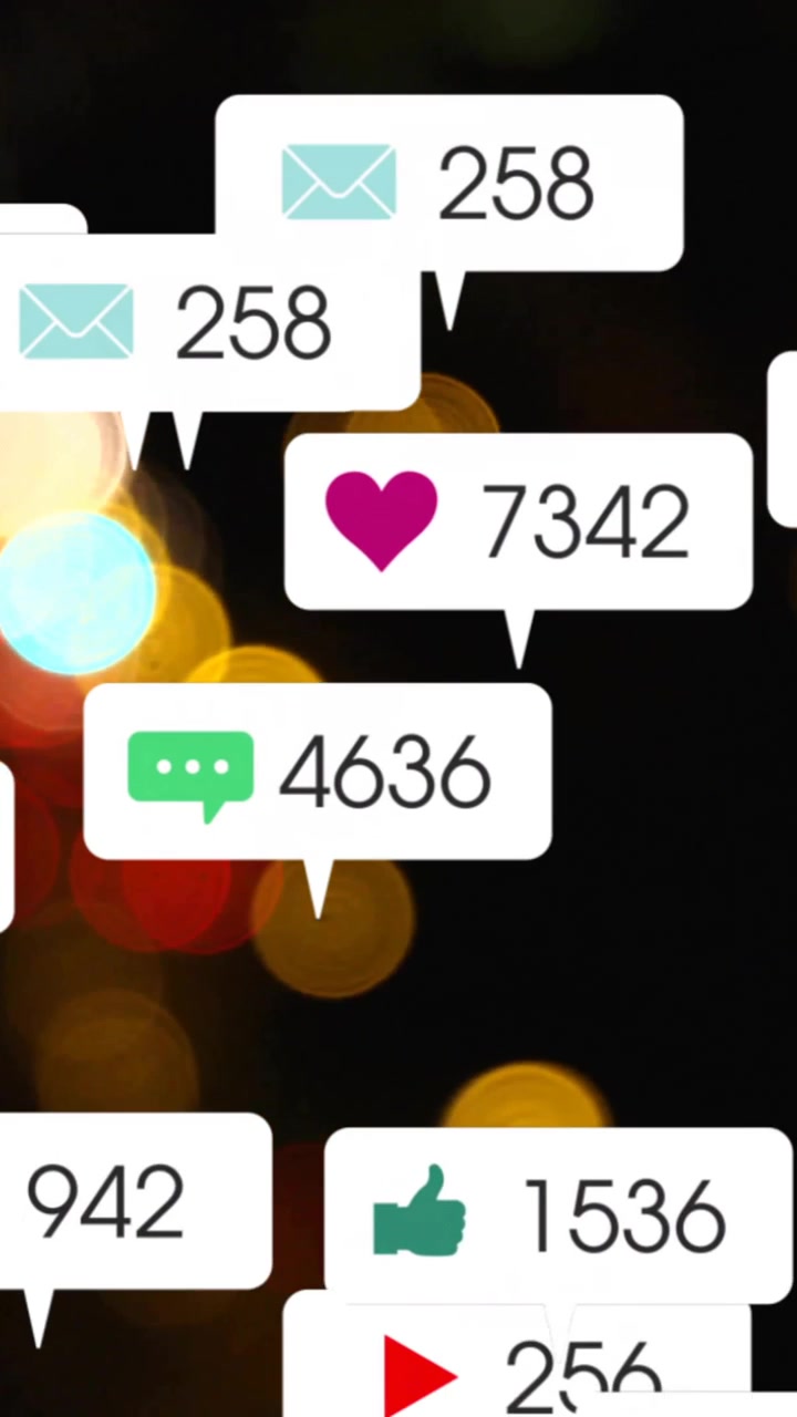 Animation of social media icons and data processing over city lights