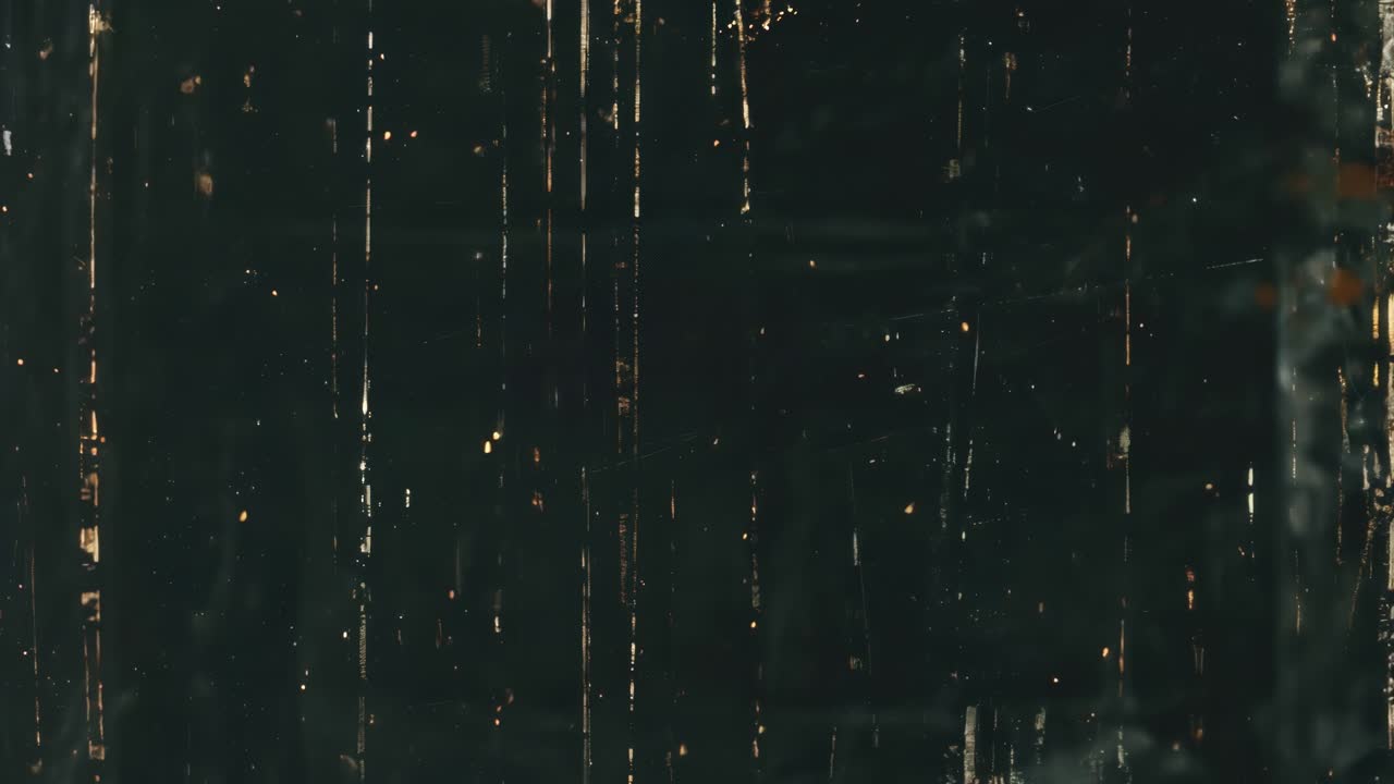 Abstract video background with a vintage, scratched film effect