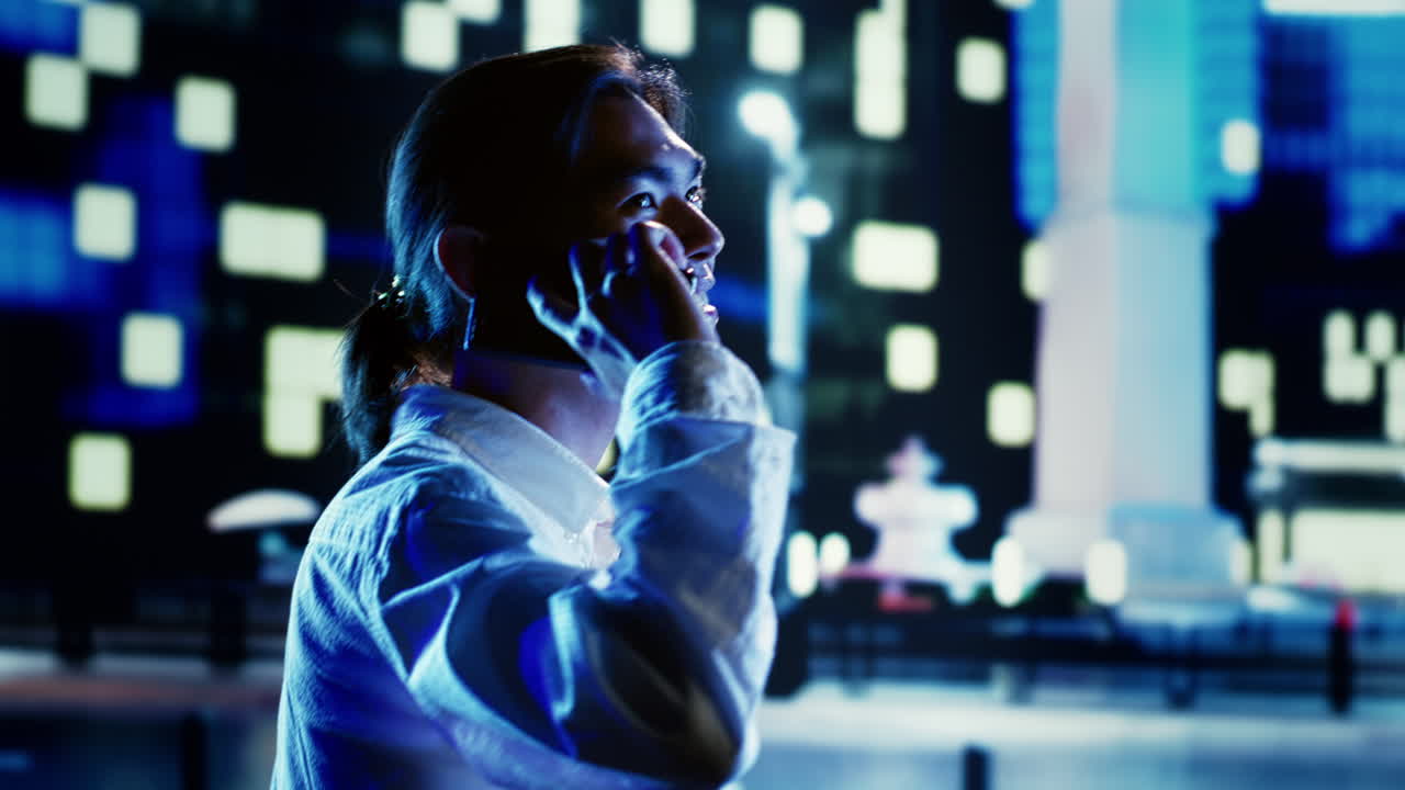 Man on the phone walking at night